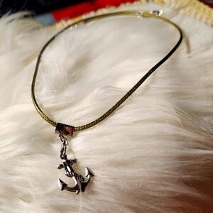 Hand crafted necklace made on a faux cord with an anchor charm